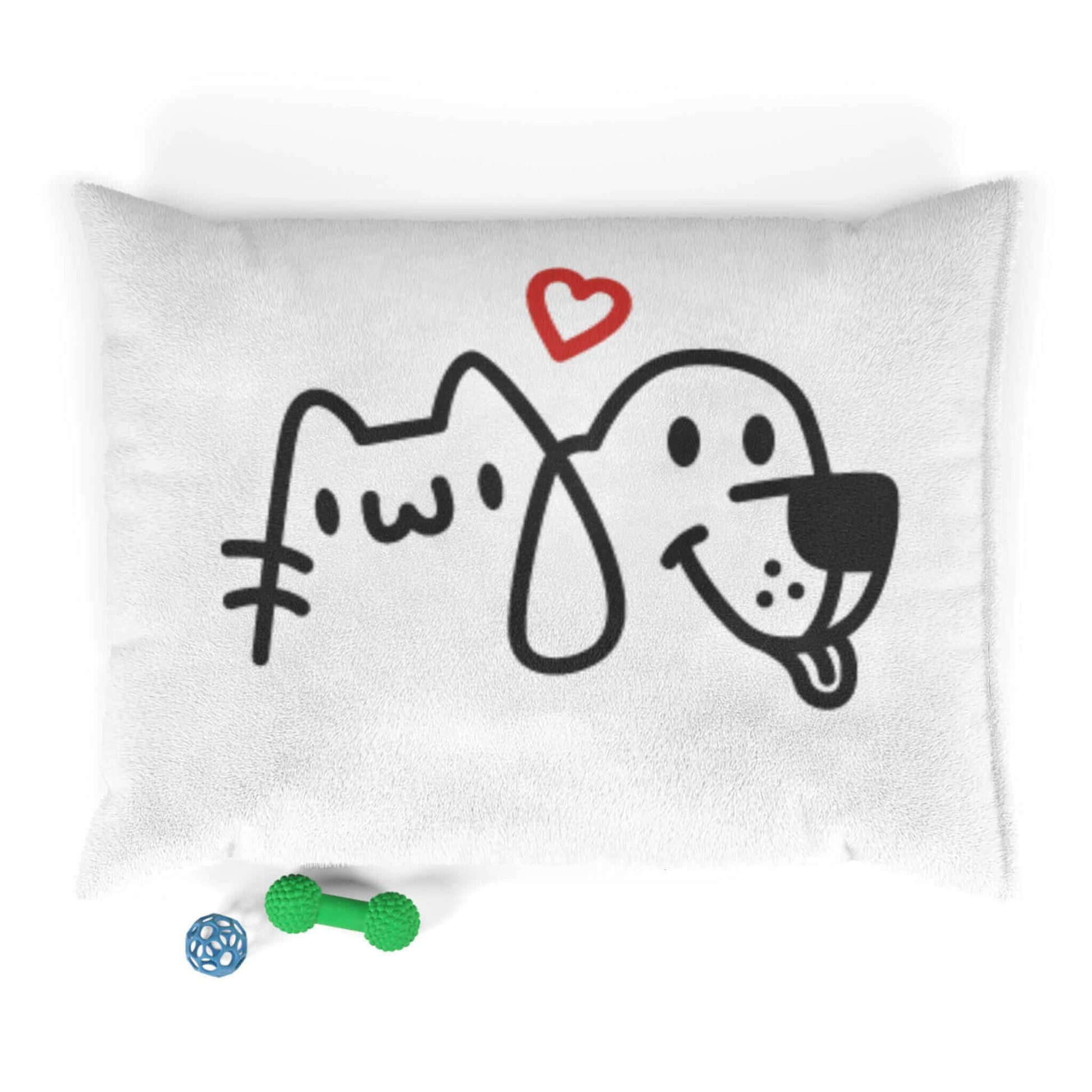 Cute cat and dog drawing on white pillow with a red heart and pet toys.